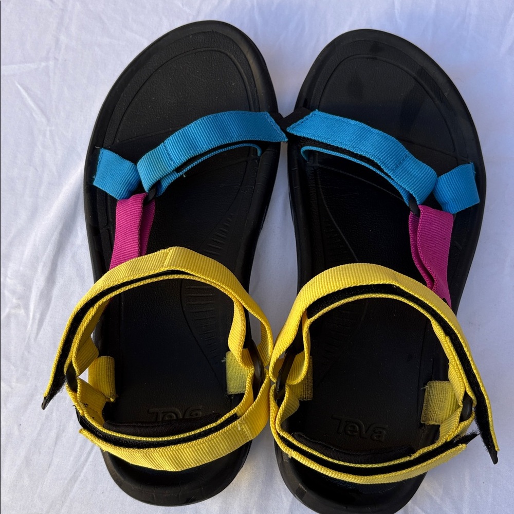 Teva Black, Pink, Yellow Sandals. The model: Hurricane. Sturdier than Original